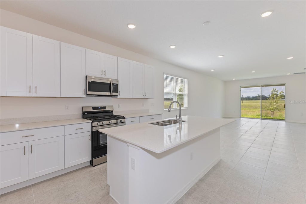 Photo of 9120 Wildlight Trail, Wildwood, FL 34785 (MLS # O6423405)
