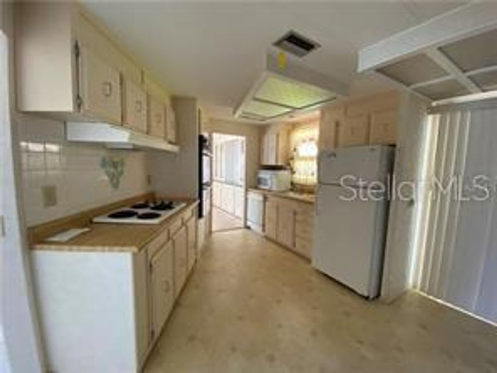 Photo of 11 Woodland Circle, Haines City, FL 33844 (MLS # S5137618)