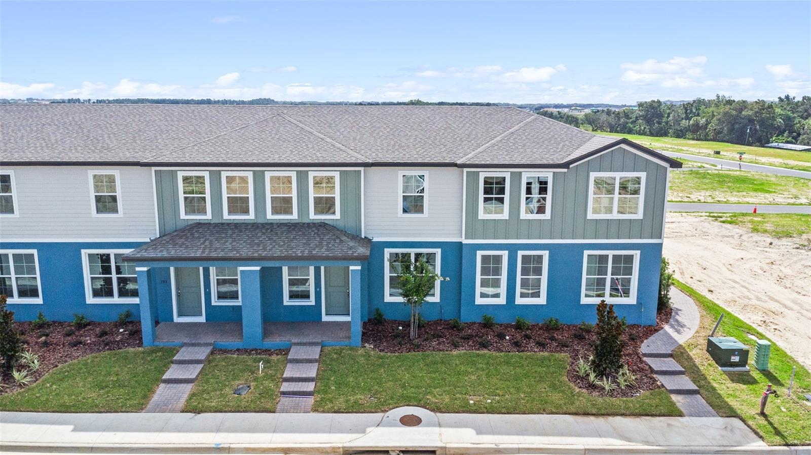 Move-in ready, this beautifully designed Galene townhome in the Eden Crest community of Apopka offers 3 bedrooms, 2.5 bathrooms, a first-floor flex room, and an upstairs loft—perfect for work, play, or additional living space. The open-concept layout features luxury vinyl plank flooring throughout the first floor, a large kitchen island, white quartz countertops, and 42" Maple Almond kitchen cabinetry. A private, fenced courtyard extends your living space outdoors, ideal for entertaining or relaxing. The spacious primary suite includes a walk-in closet and en-suite bath. This home also includes a two-car garage and offers ample storage throughout. Located near SR-429 and SR-414, Eden Crest offers resort-style amenities including a pool, cabana, dog park, tot lot, and walking trails. No CDD fees! This low-maintenance, stylish home is move-in ready—schedule your visit today! DISCLAIMER: Photos and/or drawings of homes may show upgraded landscaping, elevations and optional features that may not represent the lowest priced homes in the community. Pricing, Incentives and Promotions are subject to change at anytime. Promotions cannot be combined with any other offer. Ask the Sales and Marketing Representative for details on promotions.