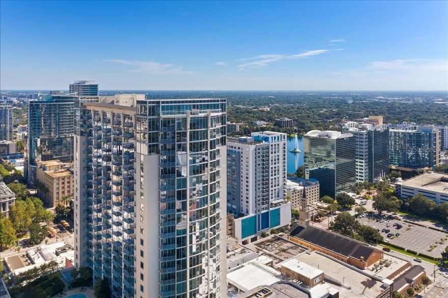 High Rise Living from the 20TH FLOOR revealing spectacular views of Orlando’s Skyline and Lake Eola. This beautiful 2 Bedroom/ 2 Bathroom
offers a Split Open and airy floorplan with 2 PARKING SPACES. Brand New carpet! The large Floor to ceiling windows allow generous natural lighting and reveals beautiful panoramic views of downtown. Your private balcony will be a perfect spot to relax with a cup of coffee in the mornings or watch the sunset at days end. Live in the middle of it all and start walking instead of driving. The Solaire has 24 hour Security and Concierge Service, Secured Gated parking, Fitness Center, Resident Lounge, and outside Pool and lounge areas. Schedule your private tour today!