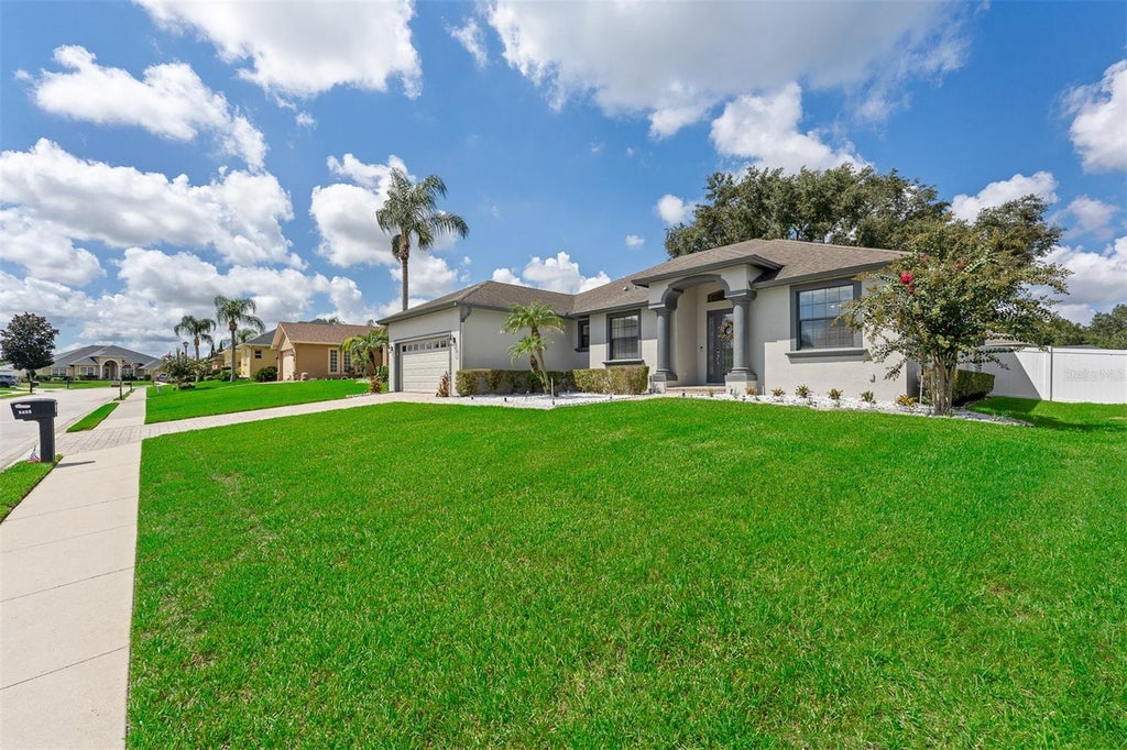 Photo of 5455 Pebble Beach Drive, Lakeland, FL 33812 (MLS # O6441798)