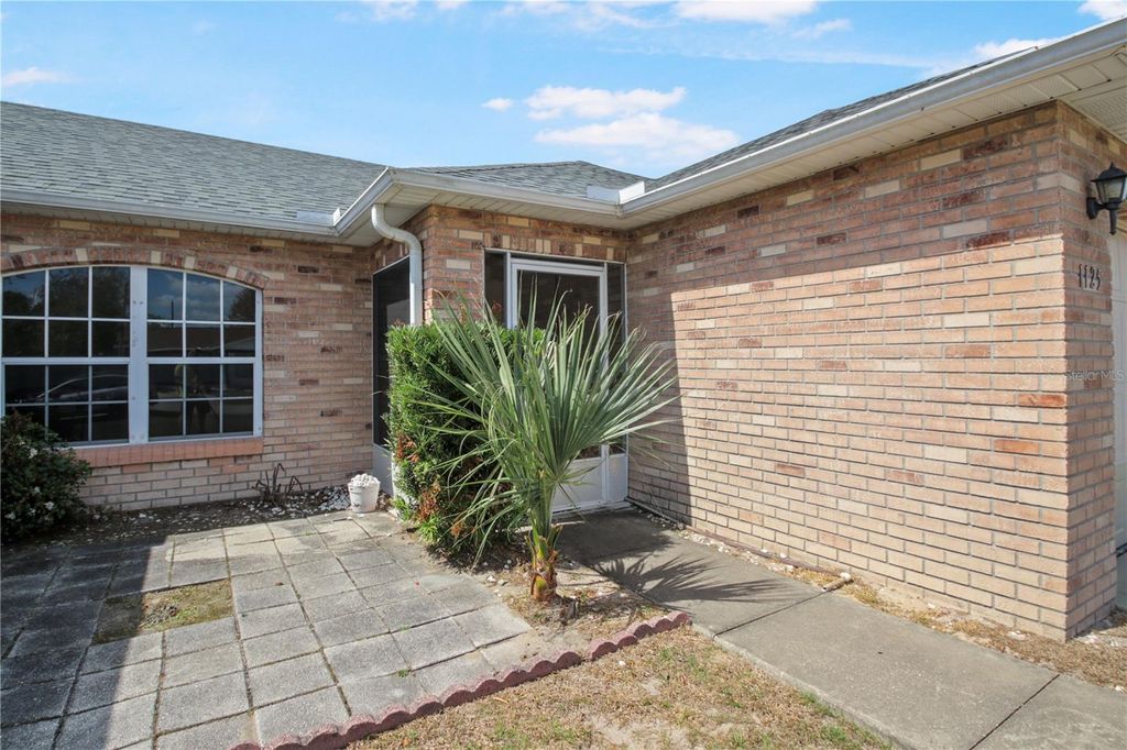 Photo of 1125 Wilmington Drive, Deltona, FL 32725 (MLS # O6390133)