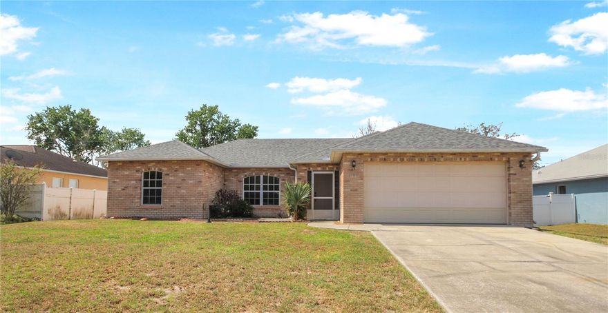 This lovely 3-bedroom, 2-bath 2 car garage home in Deltona features a striking brick elevation and a fenced-in yard, offering both curb appeal and privacy. Major updates provide peace of mind: a new roof and AC were installed in 2023, complemented by a 2022 water heater and a water softener from 2015. With a split floor plan, ample natural light, and a spacious layout, this home blends comfort with an extended screened lanai for easy living. Ideally situated close to top-rated schools, world-class shopping, popular attractions, beaches and major highways, this light and bright home offers not only modern comfort but also a prime location for convenience and lifestyle!