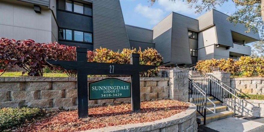 Lovely two bedroom/two full bath FIRST FLOOR “Perm” Unit. Golf course view. Large wrap-around tiled patio with three sliding doors provides indoor/outdoor living WITH view of the 12th hole on the South Course. Peaceful nature filled location. Sunningdale Lodge provides many conveniences including the much sought after TWO CAR SPACE UNDERGROUND PRIVATE PARKING GARAGE and storage closet with lodge private ELEVATOR access, locked private lobby, large in-unit laundry room complete with washer, dryer, sink and storage. Private air-conditioned storage closet included with unit. Only one neighbor across the hall. New gorgeous hardwood and tiled flooring throughout. Unit has been freshly painted with calming neutral color. Large and luxurious open and airy kitchen complete with warming drawer, new Bosch dishwasher, cabinet style Sub-Zero refrigerator and extra-large pantry. Large open living room/dining room/den combination. Opulent private en suite master bedroom with fireplace and a fabulous custom open walk-in closet. Heater in master bath. Plantation shutters. New fans and lighting. Hot Water Heater 2024. A/C system is located in private hallway closet creating a blissfully silent experience in condo. Everything about this extremely desirable unit exudes LUXURY. The WORLD CLASS INNISBROOK RESORT and GOLF CLUB is the home of the Valspar PGA Championship! Several levels of club memberships are available for purchase to participate in the Innisbrook amenities. Innisbrook Resort and Golf Club is situated on 900 wooded acres of rolling hills and 70 acres of lakes. Innisbrook is located just 25 minutes from Tampa International Airport. Innisbrook features 72 holes of championship golf, the Innisbrook Golf Institute, 10 tennis courts, 7 pickleball courts, state-of-the-art fitness center, swimming pools, 4 restaurants and 3 bars…including the new Fairways Coffee and Wine Bar featuring Starbucks coffee. Charming Dunedin, Tarpon Springs, every and all retail establishment and gorgeous Gulf Beaches are just a short drive from this little piece of lavish PARADISE!