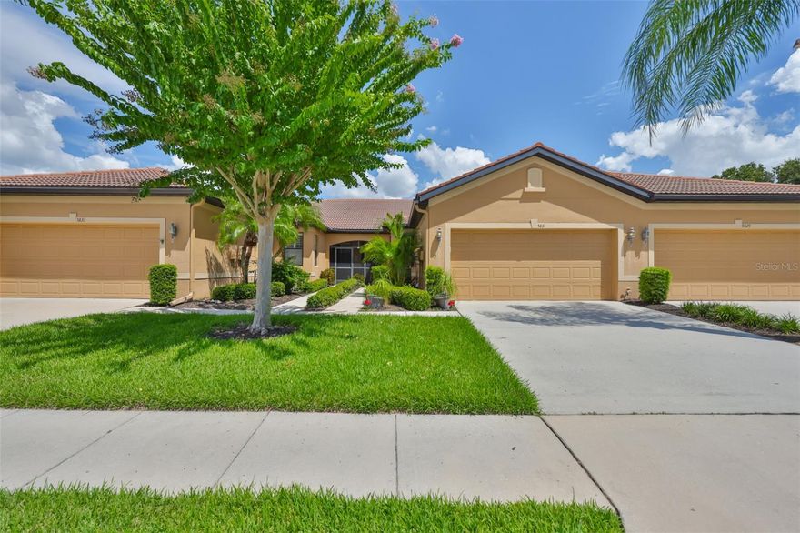 Welcome to your Oasis in the Paradise of SouthShore Falls... the Premiere 55+ Community on the West Coast of Florida! This Meticulously maintained home has it ALL with NEW A/C unit(2024), Freshly painted interior(2025), a 2 year Choice Home Warranty, Huge extended Lanai surrounded by Palm Trees and ALL windows have carefree Roll Shield Accordion Storm Shutters and a remote control Roll down Shutter on the lanai!  As you step through the screened porch and enter through the front door of this stunning 2b, 2b, PLUS Flex room(optional 3rd bdrm), you will see all the beautiful upgrades: Beautiful inlaid tile entry and diagonally set tile giving the home a rich feeling throughout, arched doorways and rounded wall corners, and BONUS... All 3 TV'S ARE INCLUDED! The gourmet kitchen features bright white cabinetry, white appliances, large pantry and breakfast bar with beautiful pendant lighting above. There is a kitchen nook PLUS a dining room area that leads to the spacious Great Room overlooking the huge extended lanai and plush greenery! The Primary Suite is very spacious with a huge Walk-in Closet and En-Suite bathroom with Dual Sinks and Step-in Shower. The 2nd bedroom is very spacious near the guest bath, with tub and shower just steps away and the split floor plan affords your guests privacy. The Flex room makes a great office or 3rd bedroom! There is an inside laundry closet with washer dryer hookups, but this seller preferred setting up laundry in the spacious 2 car garage, however you can move the washer and dryer back inside home if you prefer! (Seller liked having the closet to use for storage and an additional pantry. The extended lanai is the ultimate dream of all patios, completely tiled, remote controlled roll down storm shutter and surrounded by palm trees and foliage. This home is located near the beautiful paved walking trail that meanders through the lush woods that take you to the rear pool and pickleball courts!  Other features include: Ceiling Fans throughout, 2 car Garage with auto opener, utility sink & Storage cabinets, Pest Service monthly by Home Team, 2 year Choice home warranty included/transferrable and the list goes on! This is a must see above and beyond all the rest! Enjoy Resort-style living in this 24-hour Gated Community...Florida's Best Kept Secret Beyond Compare... Very low HOAs (NO CDDs) Pets Welcome! Spectacular recreation area in a Vacation-Style setting with Lagoon Heated pool, Resistance Pool, Spa, state-of-the-art Fitness Center, Water Aerobics, Bike Club, Walking Trails, Golf putting greens, Bocce & Pickle Ball & Tennis courts, Arts and Crafts, Billiards, Library, Card Clubs, Internet café and so many daily activities and Entertainment in the Expansive Clubhouse! Very close to World Renowned Sugar Sand beaches in any direction, Golf Courses, a public boat launch, Freedom Boat Club, Tampa Bay City Life, International Airports and Hospitals. So, Come on, get away from it all at Del Webb SouthShore Falls Paradise and Live, Laugh, and Love Life!
