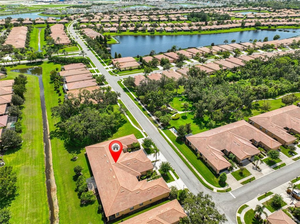 Photo of 5831 Sunset Falls Drive, Apollo Beach, FL 33572 (MLS # TB8424933)