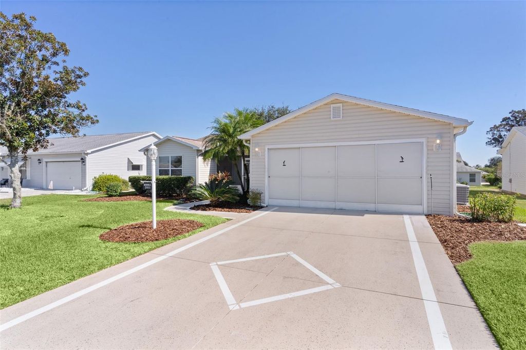 Photo of 2011 Castano Place, Lady Lake, FL 32159 (MLS # G5104157)