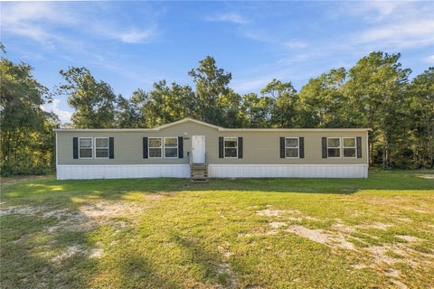 Photo of 9921 SE 160th Avenue, Ocklawaha, FL 32179 (MLS # OM734512)
