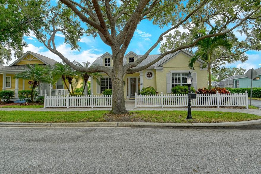 Model perfect, light, bright maintenance-free Cottage home, featuring 3 BR (or 2 and an office/den), 2 bath, updated kitchen, enclosed lanai.  The 2-car garage is accessed from a rear alleyway.  The home is completely updated with crown molding, newer appliances, white kitchen cabinets and all new wood and tile flooring.  Roof was replaced 12/2020, AC replaced 2016 (has been serviced twice a year and has a transferable maintenance visit scheduled for Dec. 2023), hot water heater replaced 2021.  Home was completely re-piped in 2014.  Spacious, enclosed lanai.  Feel secure with storm protection for all openings.  Garage offers LED lighting, epoxy floor, and storage with overhead pull-down ladder.  Located steps to the Cottages Clubhouse and heated community pool.  Rivendell is a nature lover's paradise situated on nearly 400 acres with a variety of ponds, lakes, preserves and green space. Close to Pine View School for the gifted, a nationally recognized public school, grades 2-12.  Also close to Legacy bike trail, beaches, shopping, medical and recreational facilities.  Come make this charming home yours!