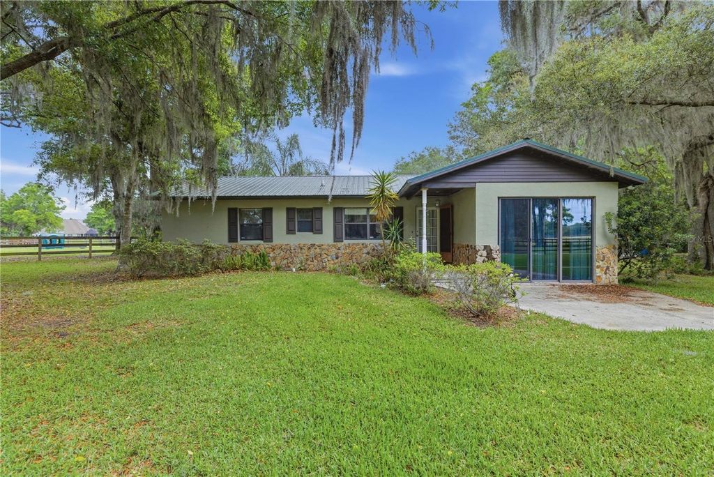 Photo of 5999 NW 90th Avenue, Ocala, FL 34482 (MLS # OM722996)