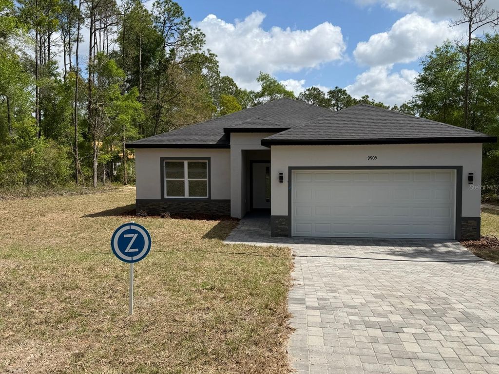 Photo of 9905 N Odessa Way, Dunnellon, FL 34434 (MLS # O6396228)