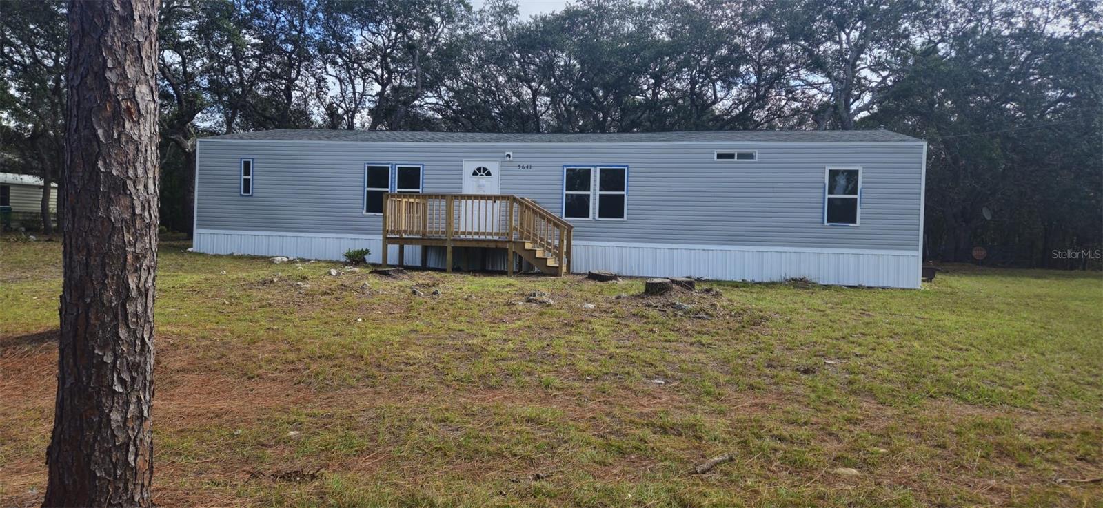 Discover the perfect blend of comfort, freedom, or investment opportunity. This expansive 1.02-acre property is already subdivided into two lots, giving you the flexibility to build a second home, guest house, or rental unit with ease.
The first lot features a completely renovated 3-bedroom, 2-bath mobile home showcasing modern luxury finishes throughout. Step into a bright kitchen with quartz countertops, new stainless steel appliances, and custom cabinetry. The primary suite offers a serene retreat with a spa-style bath and dual-sink vanity, while two additional bedrooms share a beautifully updated full bath.
Enjoy everyday convenience with an easy-access laundry area, a cozy private backyard, and ample outdoor space perfect for the upcoming fall gatherings or expansion. With no HOA, you’ll experience true ownership freedom, room to grow, play, or simply relax.
In addition to all the amazing features of this property, a seller’s concession is available to help with closing costs!