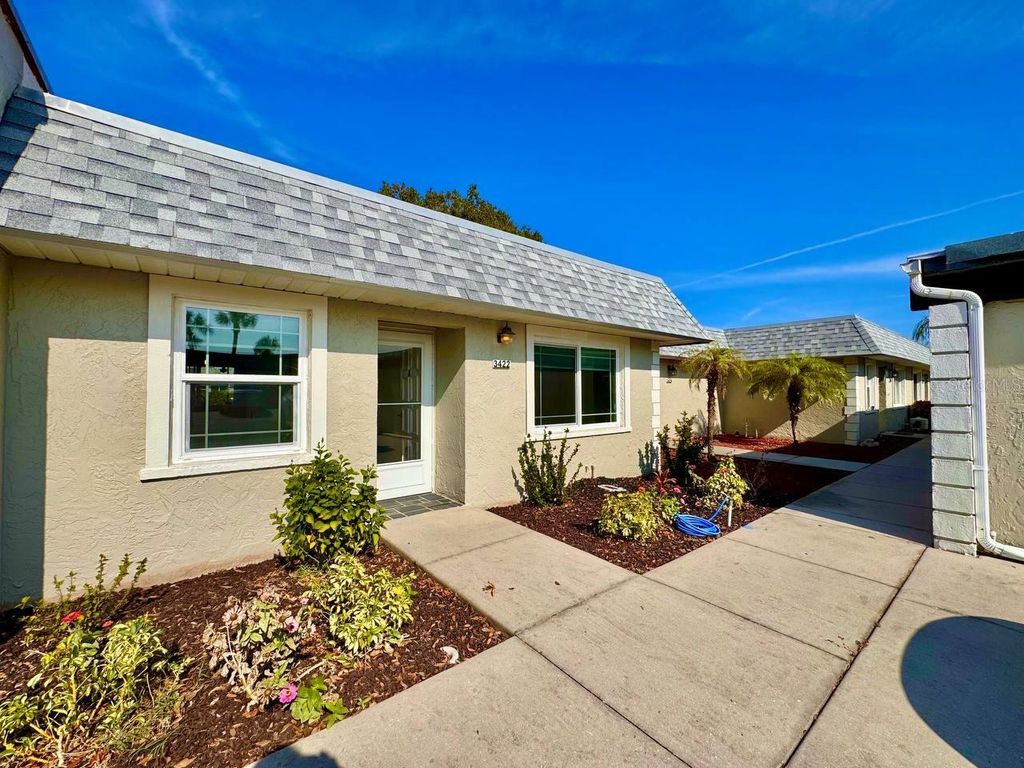 Photo of 3422 Trophy Boulevard, New Port Richey, FL 34655 (MLS # TB8452446)