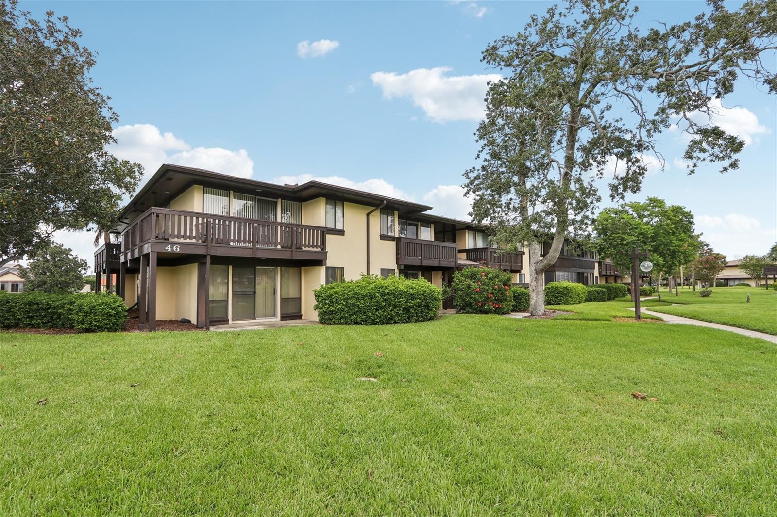 One or more photo(s) has been virtually staged. Welcome to this beautifully updated 2-bedroom, 2-bath condo in the highly desirable Palm Club community in Palm Coast. Offering 2 Bedrooms and 2 Baths with 986 sq ft of light-filled living space this condo is perfectly situated near the main saltwater canal and just minutes from the beach, dining, and I-95. Step inside to discover a fully renovated kitchen featuring modern light gray cabinetry, stylish countertops, and several new stainless-steel appliances. Contemporary luxury vinyl plank flooring flows seamlessly throughout the open dining and living area, where sliding glass doors lead to a private concrete patio. The spacious primary suite boasts its own covered patio with a canal view, a large walk-in closet, and an updated ensuite bath. The second bedroom is served by a refreshed full bath with tub/shower combo. Freshly painted in light, bright tones, this home also features tile in the kitchen and baths, ceiling fans, and a 2-year-old Lennox HVAC for comfort and efficiency. The Palm Club community offers resort-style amenities including a pool and clubhouse. The $496 monthly fee conveniently covers water, trash, cable/internet, and pest control. A public golf course is also nearby, enhancing the Florida lifestyle. Enjoy comfort, style, and location — all in the heart of Palm Coast!