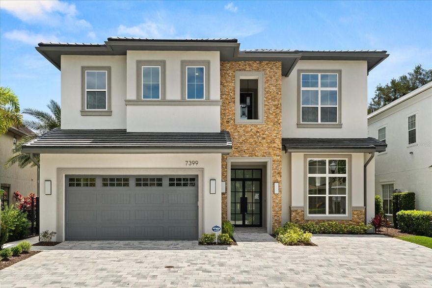 BRAND NEW HOME IN REUNION RESORT!!   Welcome to the Dream Retreat, nestled in the Impressive Reunion Resort, where luxury meets comfort in a stunning setting. This exquisite property boasts a spacious layout designed for both relaxation and entertainment, making it perfect for families and vacationers alike.
As you enter this beautifully appointed home, you are greeted by an open-concept living area filled with natural light, featuring 12’ high ceilings and elegant finishes. The gourmet kitchen, equipped with top-of-the-line appliances, quartz countertops, and ample cabinetry, invites culinary creativity. The adjacent dining area offers the perfect space for memorable family meals.
Step outside to discover your own private oasis. The expansive patio features a sparkling pool and spa, surrounded by lush landscaping, ideal for soaking up the Florida sun or enjoying evening gatherings under the stars. The outdoor area is designed for entertaining, complete with comfortable seating and a dining space, perfect for alfresco dining.
Retreat to the luxurious master suite, where tranquility reigns. The room offers a spacious layout, a walk-in closet, and an en-suite bathroom equipped with dual vanities, a soaking tub, and a separate shower. Additional bedrooms are generously sized and tastefully decorated, providing comfort and privacy for family and guests.
Located in the renowned Reunion Resort, this home offers access to world-class amenities, including three championship golf courses, a water park, multiple dining options, and a full-service spa. With its prime location just minutes from Disney World and other major attractions, this property is not only a perfect vacation home but also a lucrative investment opportunity.