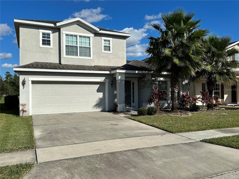 Photo of 10774 Cabbage Tree Loop, Orlando, FL 32825 (MLS # O6446726)