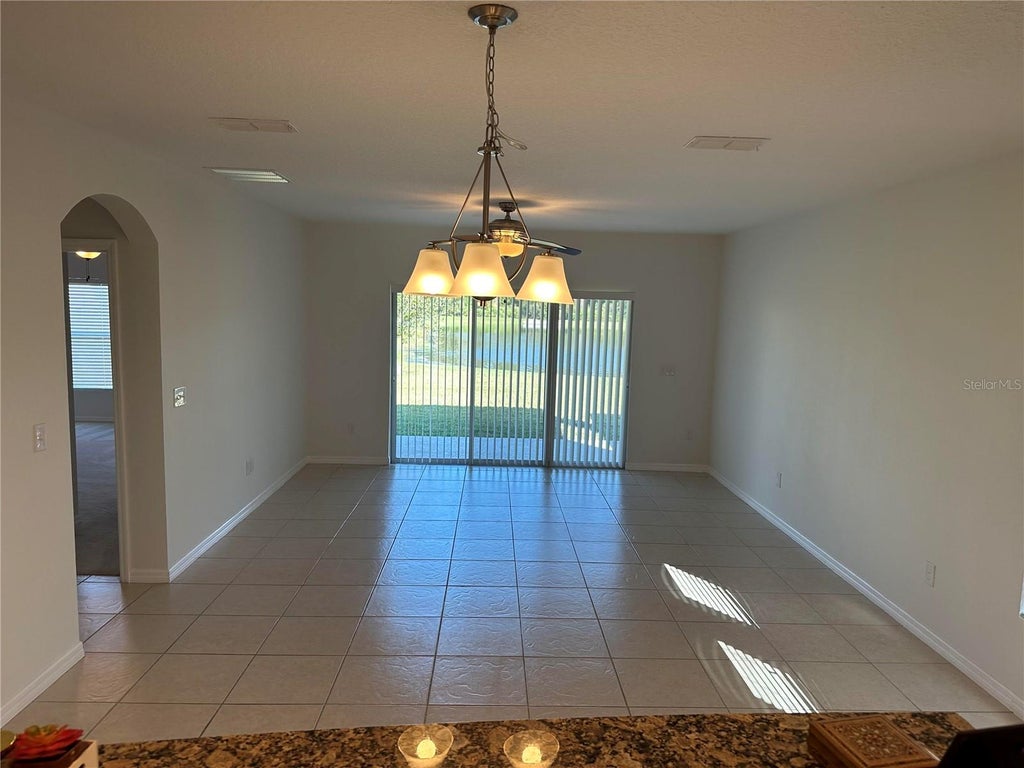 Photo of 10774 Cabbage Tree Loop, Orlando, FL 32825 (MLS # O6446726)