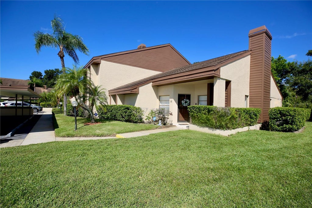 Photo of 3540 Countrybrook Lane #16, Palm Harbor, FL 34684 (MLS # TB8553464)