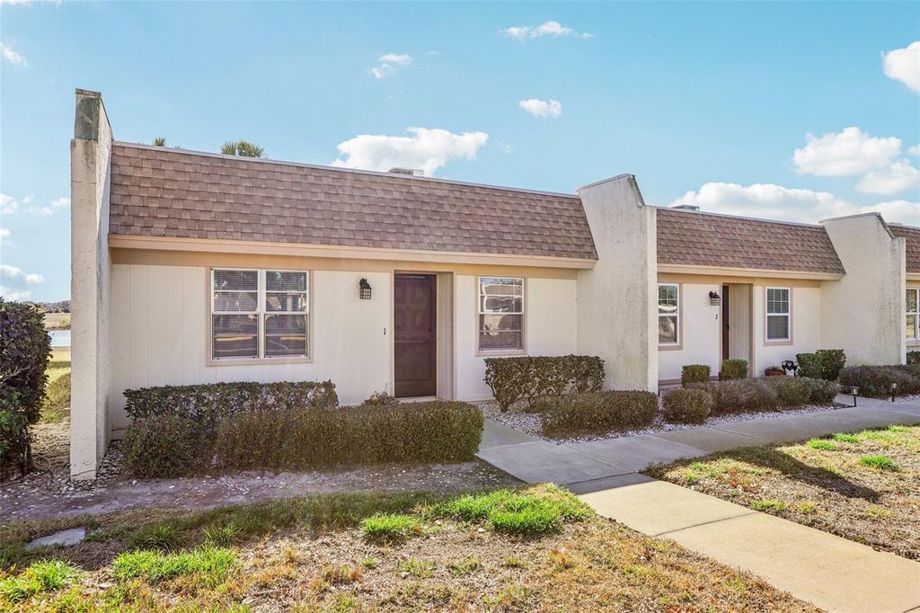 Photo of 11120 Carriage Hill Drive #1, Port Richey, FL 34668 (MLS # TB8470588)