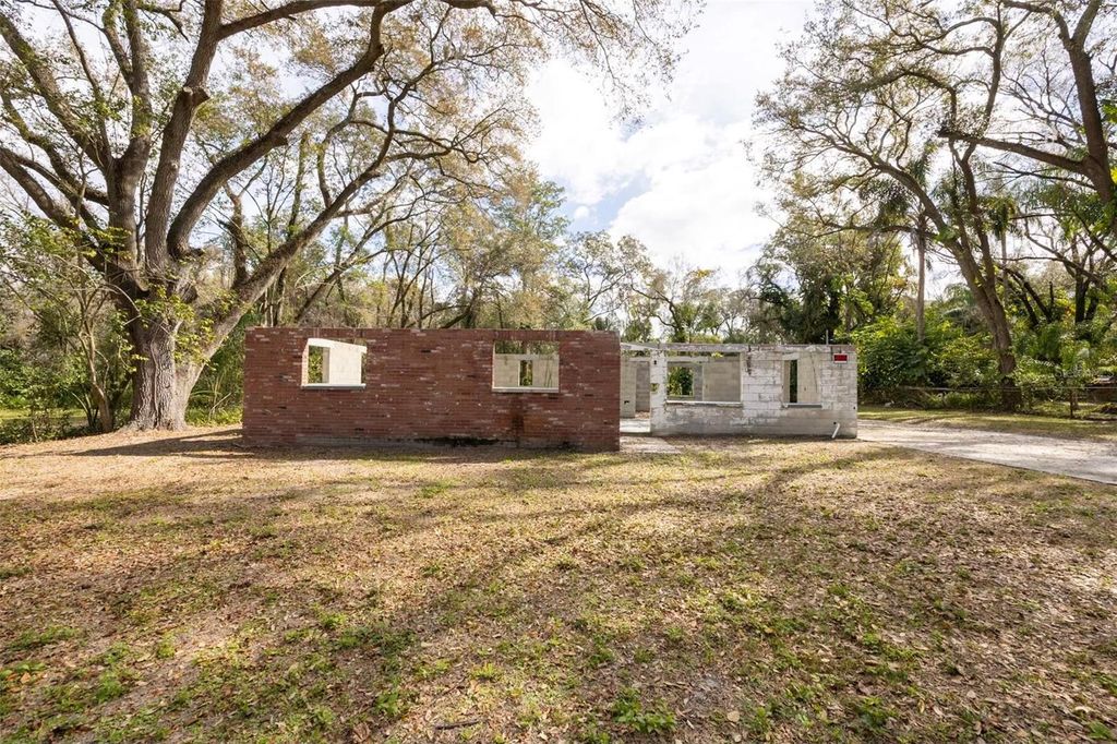 Photo of 5515 N Falkenburg Road, Tampa, FL 33610 (MLS # TB8499275)