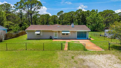 Photo of 1626 Tatum Boulevard, New Smyrna Beach, FL 32168 (MLS # NS1088290)