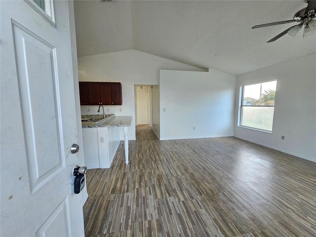 Photo of 430 Southern Charm Drive, Orlando, FL 32807 (MLS # O6399609)