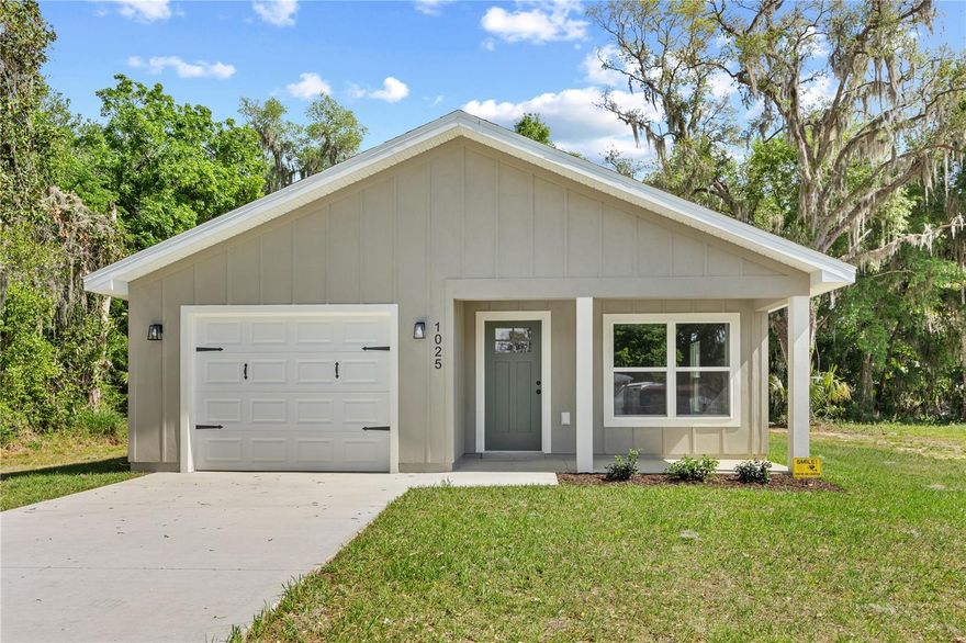 Welcome to your slice of Florida paradise! Seller willing to pay up to 4% toward buyer’s closing costs or rate buy-down. A 4% buy-down can reduce the buyer’s interest rate by approximately 1%. This just-completed new construction 3 bedroom, 2 bathroom home sits on a beautiful canal-front lot just over ¼ acre, offering direct access to Lake Panasoffkee. Inside, you’ll find a thoughtfully designed layout featuring wood-look tile throughout the main living areas and carpet in the bedrooms, a spacious master suite with a large walk-in closet, a dedicated laundry room, and a 1-car garage. Enjoy outdoor living with covered front and back porches, perfect for relaxing and taking in the peaceful surroundings. Step outside and embrace true Florida living with fishing, kayaking, canoeing, and air boating right from your backyard, with Lake Panasoffkee being a spring-fed lake known for excellent fishing. Spectrum internet is available, and you’re conveniently located just a short drive to The Villages for shopping, dining, and nightly entertainment while still enjoying a quiet, nature-filled setting. This is your opportunity to own a brand new canal-front home in one of Florida’s best hidden gems.