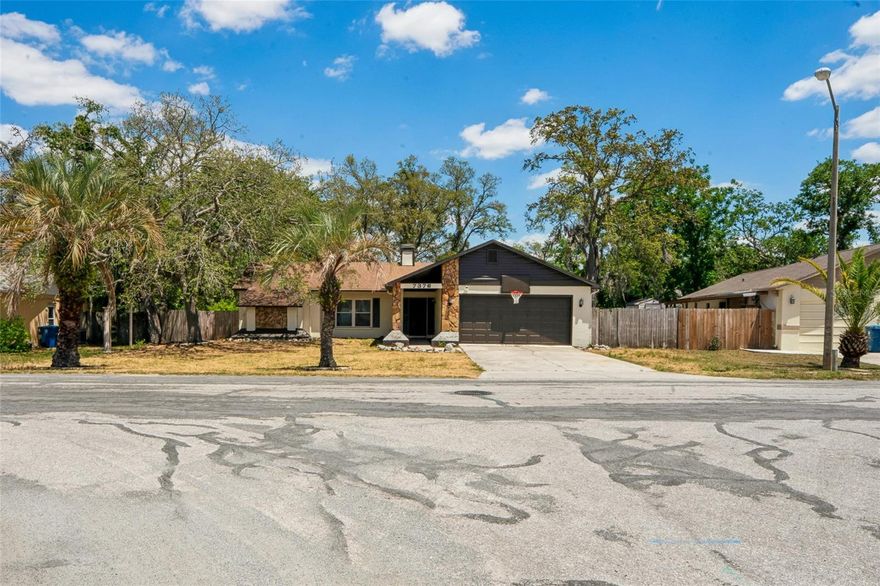 Welcome to this charming and well-maintained home featuring a decorative stone wood-burning fireplace and soaring vaulted ceilings that create a warm, open atmosphere. The desirable split floor plan offers privacy and functionality, while the eat-in kitchen provides the perfect space for everyday living and entertaining. Updates include a Brand-New AC (2025) with 10-year transferable warranty and windows (2014), freshly painted exterior and interior giving peace of mind to the next owner. Step outside to a fully fenced, oversized backyard—perfect for pets, gatherings, or relaxing evenings. Enjoy the cozy fire pit and patio lighting, ideal for unwinding or hosting under the stars. This home is priced to sell quickly at $250,000—don’t miss your opportunity! Schedule your private tour today before it’s gone.