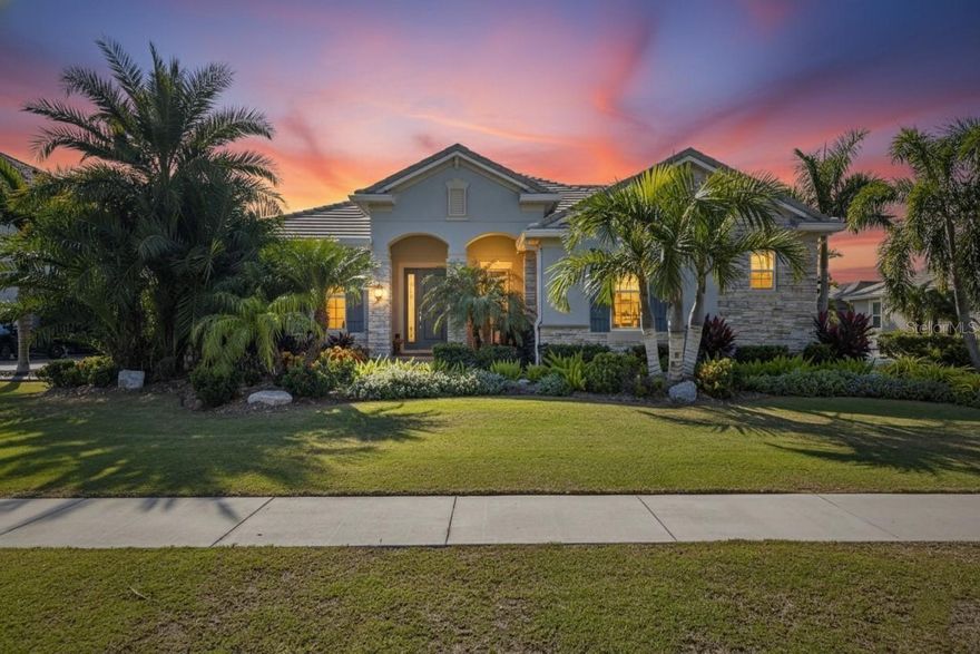 851 Manns Harbor Drive | 5 Bed | 5 Bath | 100+ Ft Waterfront | Heated Pool & Spa | Dock & Boat Lift | Generator
Back on market through no fault of the seller — clean inspection, ready to close, and now your opportunity to own one of MiraBay's most exceptional waterfront homesites before another buyer does.
Sitting on over 100 feet of frontage along one of MiraBay's widest and deepest waterways, this Apollo Beach waterfront home delivers the kind of lot that simply doesn't come available. With approximately 200 feet of depth and direct, no-bridge access to Tampa Bay, this is genuine boater's paradise — private dock, 16,000-lb boat lift, and electric and water hookups ready to go the day you close.
Out back, a resort-caliber outdoor space anchors the property: a 20x40 heated pool with integrated spa, covered summer kitchen, and a panoramic screen enclosure that keeps the lagoon views wide open and uninterrupted. This is the backyard people build dream homes to have.
Inside, nearly 4,000 square feet of open-concept living is designed for both everyday comfort and serious entertaining. The gourmet kitchen features double islands, quartz countertops, double wall ovens, pot filler, stainless appliances, deep pantry, and seating for a crowd — all flowing directly into the great room and oversized dinette. A split floor plan gives everyone their own space, including a primary suite with lagoon views, automated shades, custom walk-in closet, soaking tub, walk-in shower, dual vanities, and private water closet.
The layout is genuinely flexible: four additional bedrooms including one with en-suite bath, an upstairs bonus room with built-in wet bar, a dedicated office with French glass doors, and a formal dining room currently concealed behind a faux bookcase wall — easily converted to a second office, media room, or home gym. The home is finished with tile roofing, hurricane-rated sliding glass doors, built-in closet organizers, an oversized three-car garage with storage systems, and a whole-home generator.
All of this sits inside MiraBay's gated waterfront community in Apollo Beach — golf cart-friendly, with resort-style amenities including a clubhouse, café, 24-hour fitness center, pools, tennis, pickleball, parks, and year-round events. Homes with this waterfront lot size, pool and spa, dock and boat lift, Tampa Bay access, and standby generator rarely surface. Schedule your showing today.