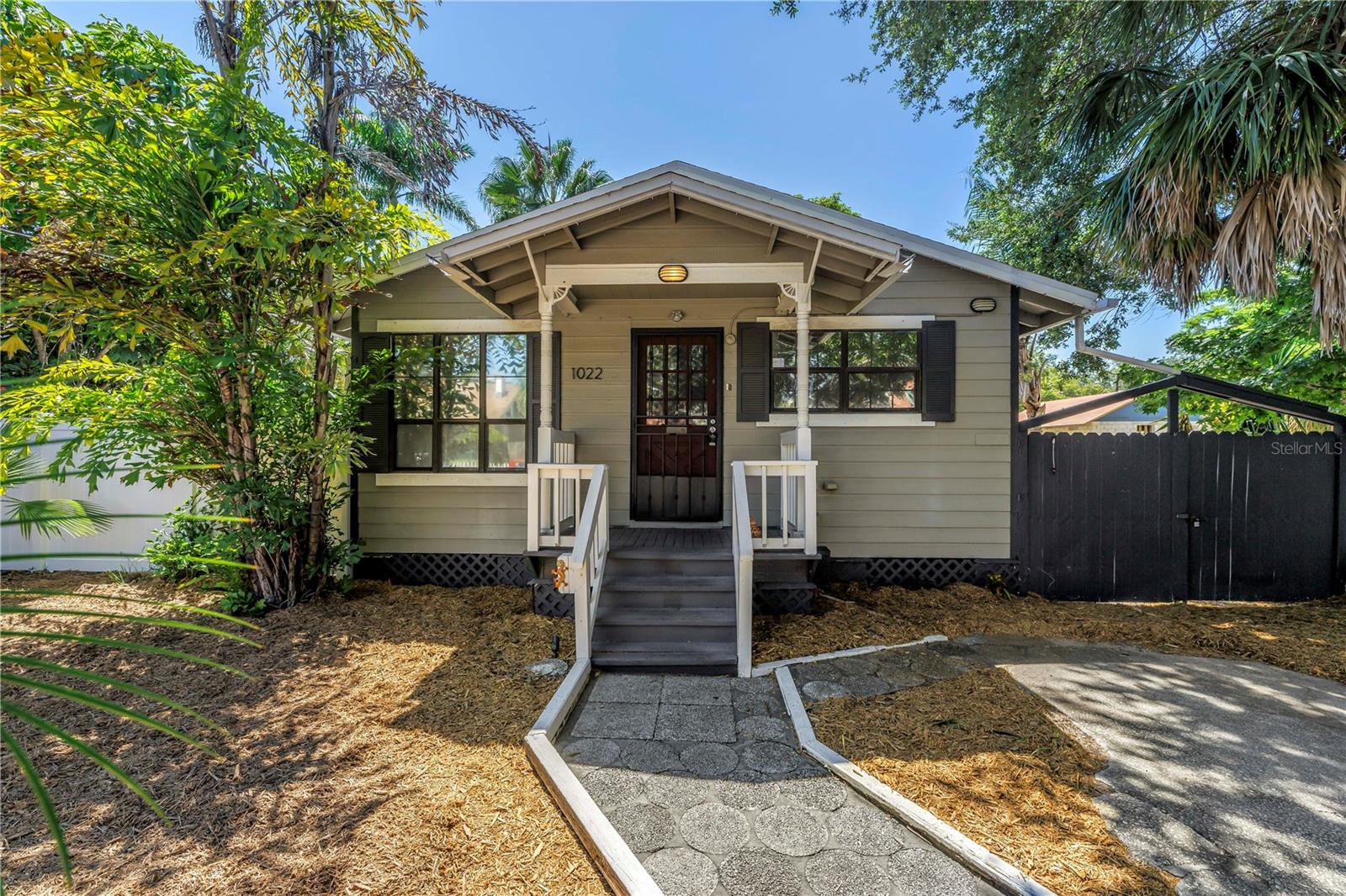 Enjoy the convenience of no HOA, no flood insurance, and a non-evacuation zone. Sitting on a 5,800 sqft lot, this home proves that the best things come in small packages!
This fully renovated and tastefully furnished 2BR/1BA cottage in Historic Uptown St. Pete is the perfect blend of charm, efficiency, and location. Built in 1993 and thoughtfully updated, every square inch of this home has been maximized with artistic flair and attention to detail.
The home currently has one full bathroom, and a former half-bath has been modified into a closet. The sink remains in place, making it simple for a future buyer to easily convert it back into a half-bath by adding a toilet.
Enter through a white picket fence into a bright, tiled interior featuring a well-equipped kitchen and in-unit washer and dryer. The private backyard is a lush oasis with mature fruit trees, custom decking, and a covered paved area ideal for entertaining—or for use as a carport.
Located in a quiet, artsy neighborhood just minutes from downtown, Crescent Lake Park, and the waterfront, you’re within walking or biking distance to pickleball and tennis courts, dog parks, and countless restaurants, breweries, and museums. With off-street parking and quick access to the beaches and airports, this home is a true gem in one of St. Pete’s most desirable areas.