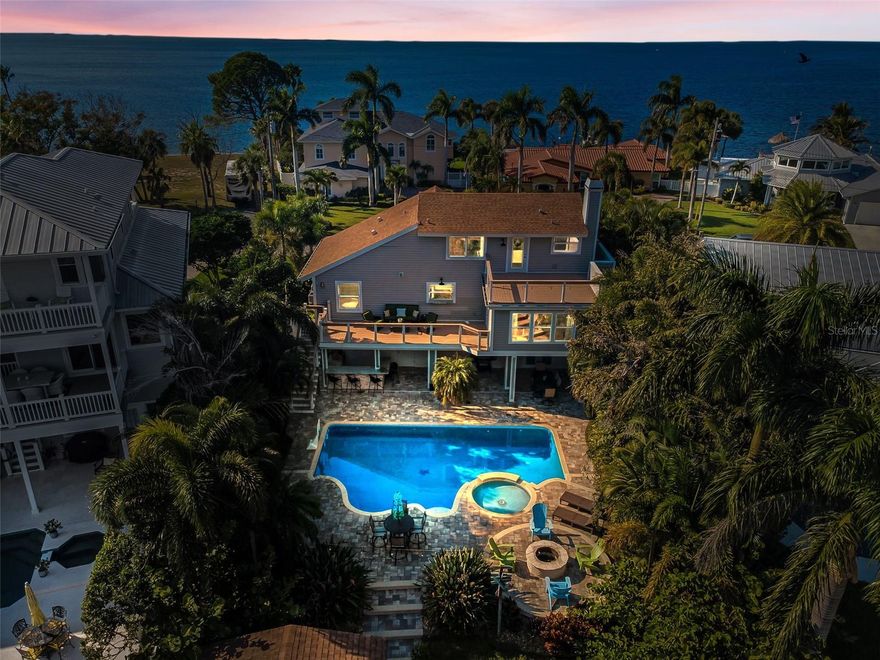 Welcome to 110 Carlyle Circle, in a lush tropical waterfront community that captures the true essence of Florida living. From the moment you arrive, you’ll appreciate the quiet, tree-lined street and the inviting curb appeal that sets the tone for this warm and welcoming residence. Inside, the home offers a bright, open layout designed for comfortable living and effortless entertaining, with spacious gathering areas, abundant natural light, and thoughtful finishes throughout.
At the heart of the home is a well-designed kitchen that brings both function and comfort together. Featuring ample cabinetry, generous counter space, and a layout that flows seamlessly into the adjoining living and dining areas, this kitchen is perfect for everyday cooking as well as hosting friends and family. Whether preparing a quick breakfast or a full holiday spread, you’ll love how connected the space feels to the rest of the home.
The outdoor areas offer even more room to relax and enjoy the Florida lifestyle. Step outside to a private backyard setting with room to garden, grill, entertain, or simply unwind at the end of the day. The multiple outdoor living spaces create a natural extension of the home, giving you endless opportunities to enjoy warm breezes, morning coffee, or weekend gatherings.
On the ground level, a spacious bonus area adds incredible flexibility to the floor plan. This versatile space can serve as a home office, gym, media room, playroom, or guest retreat—whatever best suits your lifestyle. With its convenient location and generous size, it provides the kind of extra room buyers love but rarely find.
Upstairs, the master suite occupies the entire third floor, creating a private getaway all your own. The elevated position allows for peaceful separation from the main living areas, and the suite offers plenty of room for a king-size bed, reading nook, and additional furniture. The adjoining bathroom and storage options add comfort and practicality, making this top-floor retreat a true highlight of the home. 
Located just minutes from top-rated schools, beautiful Gulf beaches, local parks, golf courses, and all the dining and shopping Palm Harbor is known for, this home blends convenience with the charm of Florida living. With its thoughtful layout, inviting spaces, and ideal location, 110 Carlyle Circle is the perfect place to call home.