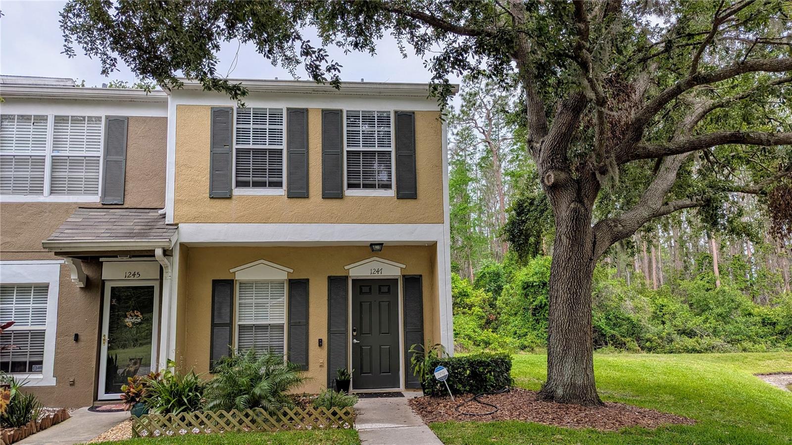 Beautiful end unit townhome in gated village of Vermillion in Meadow Pointe. This beautiful 2 bedrooms, 2.5 baths located in the heart of Wesley Chapel. Pride of ownership is seen throughout. The owners have updated the kitchen with cabinets, countertops, backsplash and stainless steel appliances. Enjoy cooking while overlooking the great room with upgraded flooring. The handrailing and stairs are also updated. The 2 bedrooms have upgraded carpet and both baths have updated cabinetry. Relax in the nice size screened lanai with a view of the conservation. See this gem for yourself!!