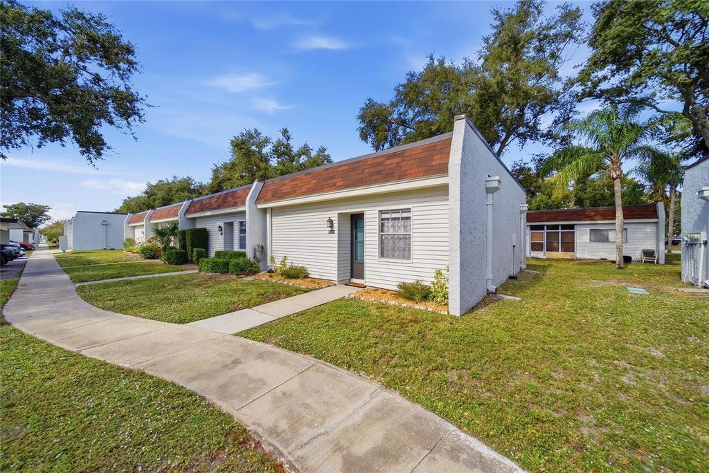 Photo of 13717 Mission Oaks Boulevard, Seminole, FL 33776 (MLS # TB8454165)