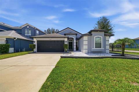 Photo of 4037 Warwick Hills Drive, Wesley Chapel, FL 33543 (MLS # TB8538829)