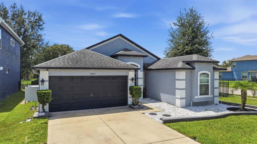 Photo of 4037 Warwick Hills Drive, Wesley Chapel, FL 33543 (MLS # TB8538829)