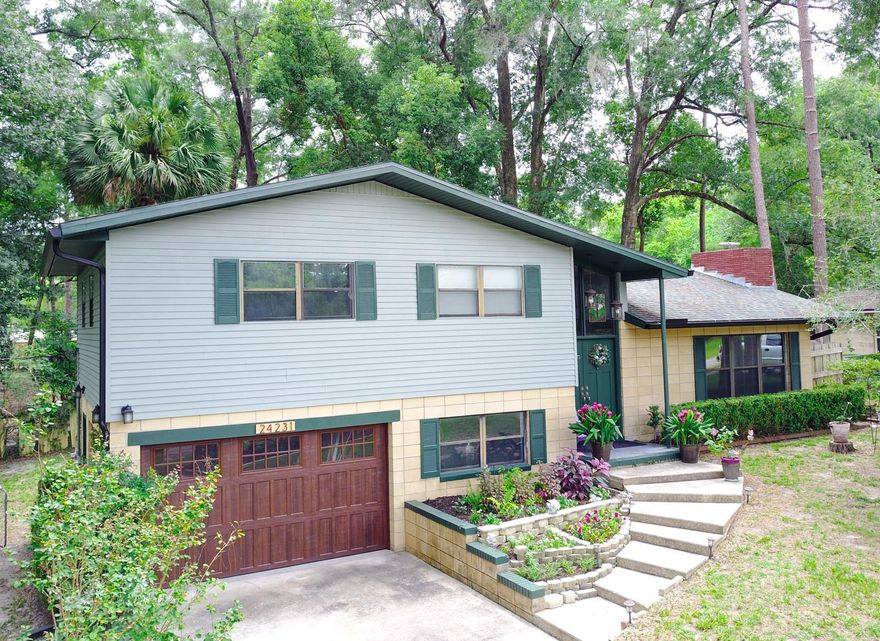 Welcome to your dream home nestled in the heart of High Springs, where old-world charm meets contemporary sophistication. This captivating 3-bedroom, 1.5-bathroom residence has been meticulously updated, leaving no stone unturned. Prepare to be enchanted by its impeccable features and stylish finishes that seamlessly blend timeless appeal with modern comforts. As you approach the property, the first thing that catches your eye is the stunning curb appeal. The home welcomes you with an abundance of natural light that dances off the freshly painted walls and gleaming hardwood bamboo floors. The open-concept layout effortlessly connects the living spaces, creating a sense of flow and unity throughout. The custom kitchen showcases stainless steel appliances, granite countertops, a custom wine rack, real hardwood cabinets and a butcher block counter providing an additional touch of warmth and rustic elegance, adding character to this culinary masterpiece. Just off the kitchen, the formal dining room beckons with its vaulted ceiling, and is complimented by 3 large windows welcoming in the natural light. Retreat to the living room, a haven of relaxation and comfort. The slate gas fireplace adorned with elegant granite tiles creates a warm and inviting atmosphere. The master bedroom is generous in size and offers a walk in closet complete with a shoe caddie to keep your collection organized and beautifully displayed. The master bathroom features a black granite dual sink with a tub/shower combo and flooring that is porcelain tiles with marble trim. The beautiful landscaping envelops the property, offering a peaceful retreat where you can unwind and connect with nature. The home also comes with a 10 X 12 utility shed. Additional upgrades to this home include crown molding, new roof in 2018, gutters in 2022, hot water heater 2022, HVAC and air ducts 2023, 12 inch insulation and a low utility bill. The half bathroom offers plenty of room for a full shower or tub with plumbing in place for install. This home is just minutes to downtown High Springs, world class springs and 10 minutes to I-75 in Alachua. The seller will provide a 1 year general home warranty. Call today for a showing!