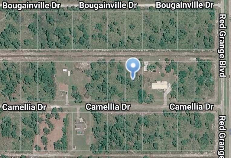 Photo of 10 Camellia Drive, Indian Lake Estates, FL 33855 (MLS # O6438264)