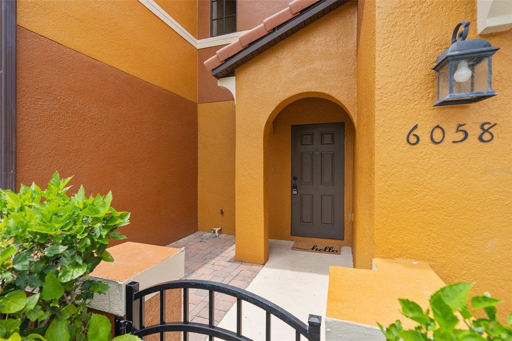 Photo of 6058 Tivoli Gardens Boulevard, Orlando, FL 32829 (MLS # S5153569)