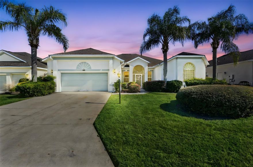 One or more photo(s) has been virtually staged. “Location! Location! Location!”  Welcome home to this UNIQUE, PRIVATE, *WATER & CONSERVATION VIEW*  home in Plantation of Leesburg! Views like this don't come by often! **NEW ROOF COMING JANUARY 2026!** (AC 2024). **Please Note: This home comes with a CARPET ALLOWANCE – giving you the chance to choose your own flooring and make it your own! This floorplan is one of the best in the community, featuring high ceilings, an open floorplan with 3 bedrooms, 2.5 bathrooms, PLUS a Dining Room Space, and Living Room + Family Room open concept! With beautiful views from almost every room. The split floorplan offers 2 guest bedrooms on the left side, both sharing a full bath for convenience – perfect for family and guests! The kitchen is large and is open with a bar area – great for entertaining. The Master bedroom is on the opposite side of the home, overlooking the beautiful pond/conservation! The master bedroom is large with sliding glass doors that lead to your covered, screened-in lanai, and has an expansive bathroom with a beautiful soaking tub, walk-in closets, dual sink vanities, and a comfortable shower. The outside lanai is PARADISE as you have a covered area to relax and enjoy the private scenery, birds & wildlife, and enjoy the Florida breeze – your own private oasis! The Laundry Room is large and features cabinets and utility sink for your convenience. The garage is an EXTRA BENEFIT as it has an extra 4’ extension for all your storage! Plantation of Leesburg offers a lifestyle of luxury and fun with 3 resort style pools, 2 Fitness Centers, Craft Rooms, Art Rooms, Billiards room, and so much more! Extra amenities such as pickleball, tennis, basketball, horseshoes, bocce courts, craft room, library, and so many planned activities will make sure you are living your best life. Plantation of Leesburg is conveniently located less than 30 minutes from the Villages, approximately an hour from Orlando’s International Airport, Disney and Universal theme parks, and less than two hours from the beaches on either coast. Discover the best of 55+ living at Plantations - where every day brings the opportunity to explore, relax, and enjoy the natural beauty that surrounds you! Call today for your private tour!