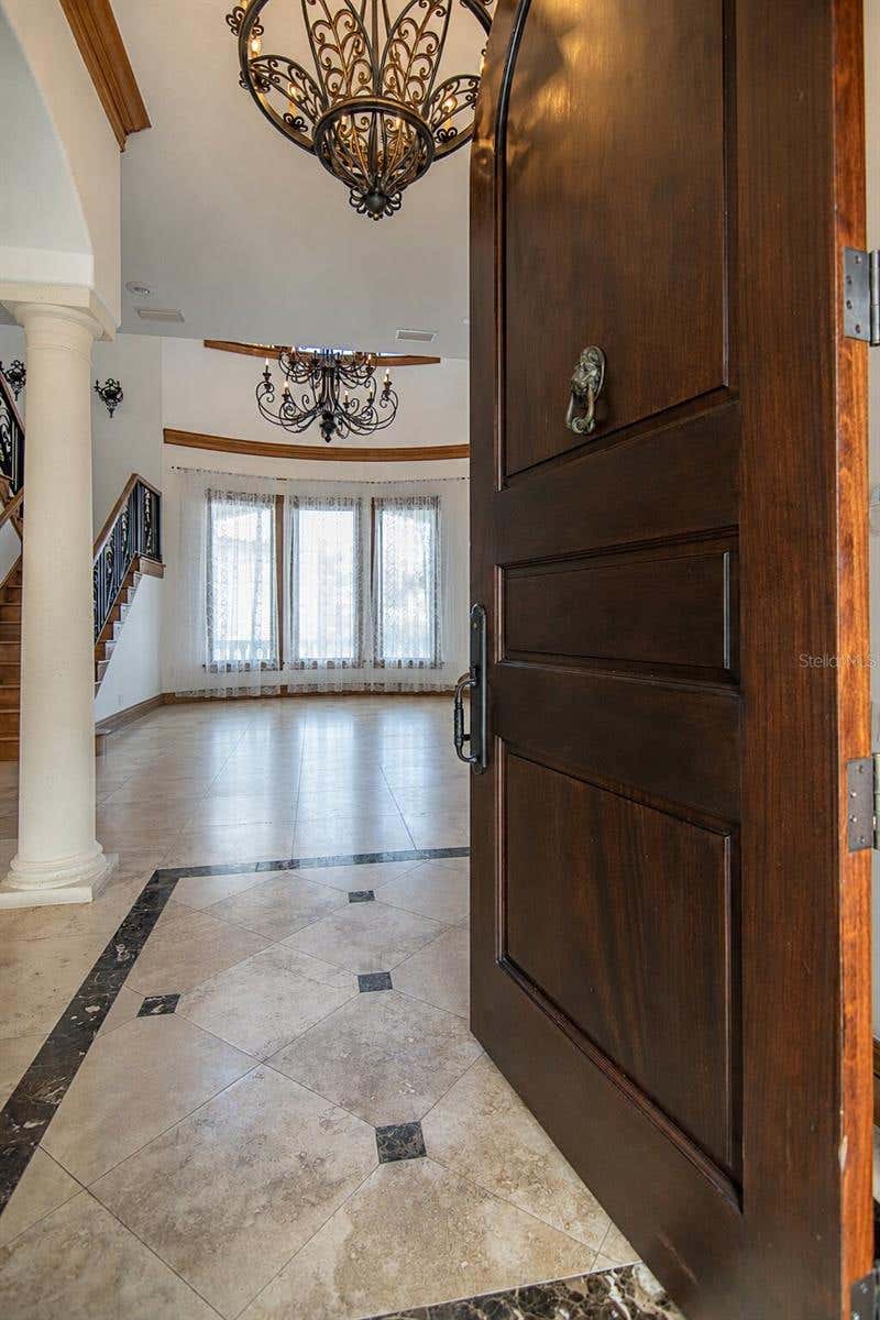 Photo of 5211 W Neptune Way, Tampa, FL 33609 (MLS # TB8535350)