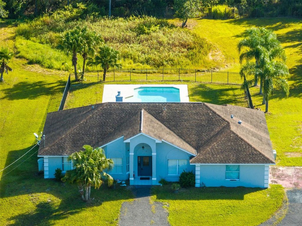 Photo of 2225 Bronco Drive, Saint Cloud, FL 34771 (MLS # S5136925)