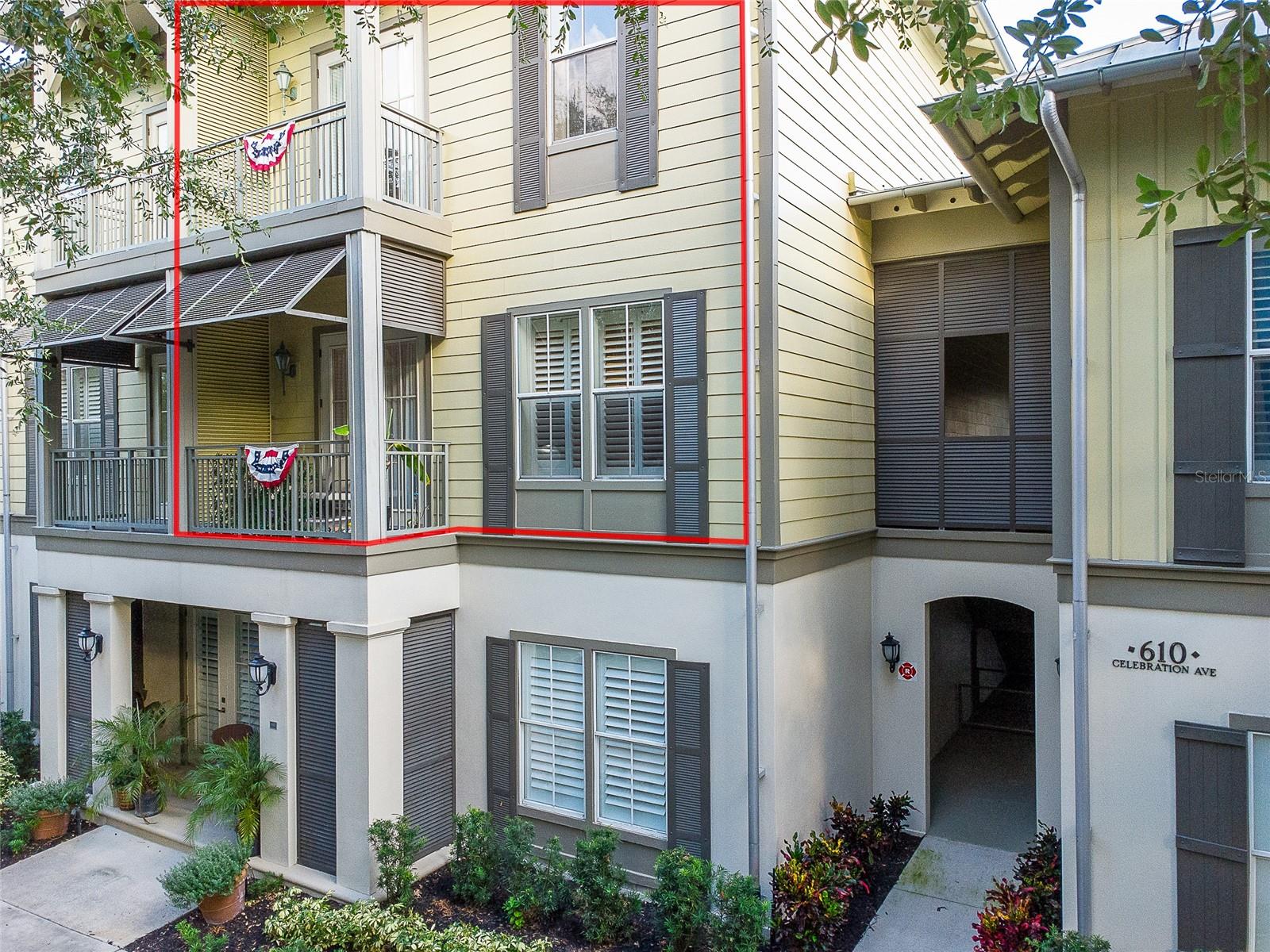 Beautiful second-floor Carlyle condo in the heart of Celebration, just one block from downtown shops, dining, and trails! This spacious 3BR/2BA Carlton floor plan offers single-level living with hardwood floors, crown molding, plantation shutters, and high ceilings. The open kitchen features granite countertops, stainless steel appliances, under-cabinet lighting, a pantry, and a chef’s island with bar seating. French doors open to a large balcony with serene views. The front flex room works as a 3rd bedroom or office. The oversized primary suite includes a walk-in closet, multiple additional closets, and a spa-style bath with a soaking tub and a separate shower. Bedroom 2 has its own wing with a private bath and a custom closet. Includes washer/dryer, new A/C, and private garage—elevator access. HOA has recently painted and landscaped the buildings. Enjoy nearby Lakeside Park, pools, courts, and Celebration’s year-round events. Just minutes from Disney and Orlando Intl Airport!