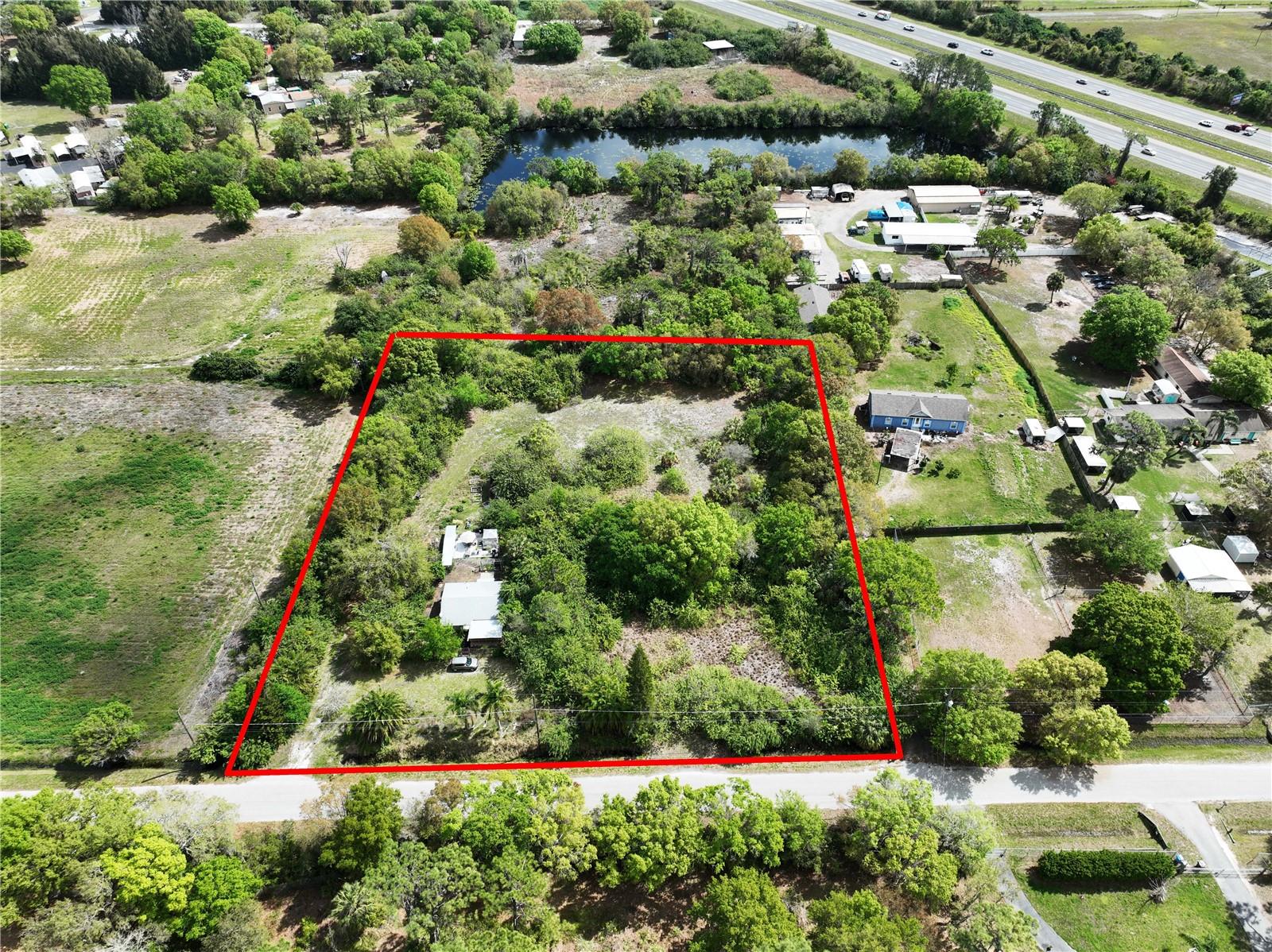 *FINANCING FELL THROUGH* This property is conveniently located near the I-75 corridor in the Ruskin Colony Farms 1st Extension, near Sun City Center, the Amazon Distribution Center, and a short distance to Tampa Airport. The property is partially developed, and utilities are available. The property has electricity and water connected. There is a small home on the property (if removed, the parcel will have to be rezoned for Residential)—ideal location for small strip centers, offices, private or public school, automotive shop, bar or restaurant. Perfect location for landscaping or garden supply center.
This parcel is currently zoned CN with FLU (see below).
The future land use designation, which governs what the property could be rezoned to, is Residential-4. This designation allows for the potential rezoning to a zoning district that would allow for up to four dwelling units per gross acre in situations that represent an ideal set of circumstances about the compatibility of the proposed development with surrounding land uses, existing and/or approved, and about the adequacy and availability of public facilities.
Pre-submission with Hillsborough County Planned Development is recommended if re-zoning is being considered.
The property currently has a small home that is being rented (Please DO NOT DISTURB TENANT).