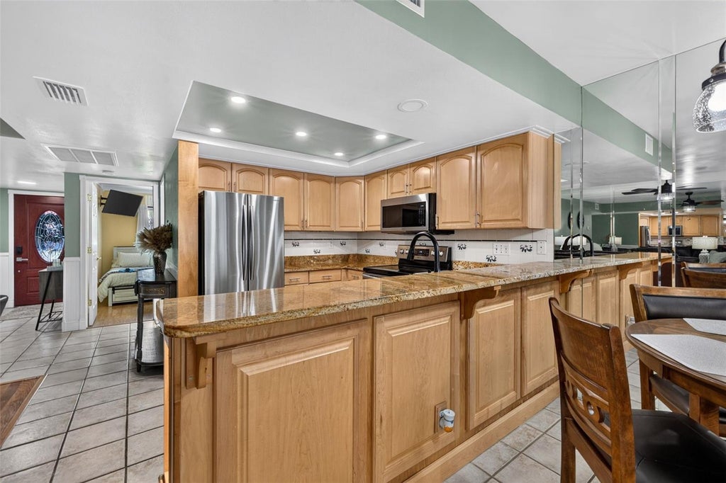 Photo of 7360 Ulmerton Road #18D, Largo, FL 33771 (MLS # TB8545706)