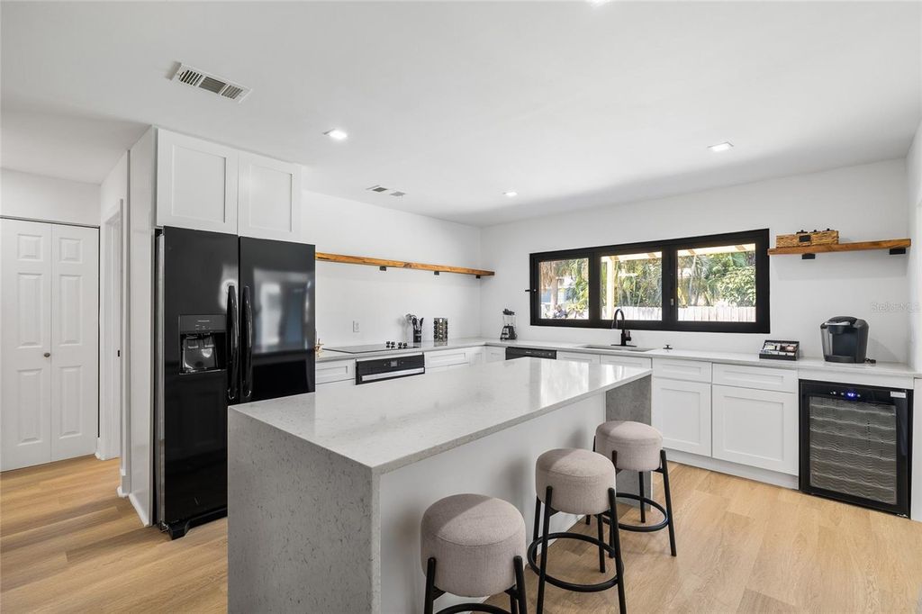 Photo of 5910 Denver Street NE, St Petersburg, FL 33703 (MLS # TB8437569)