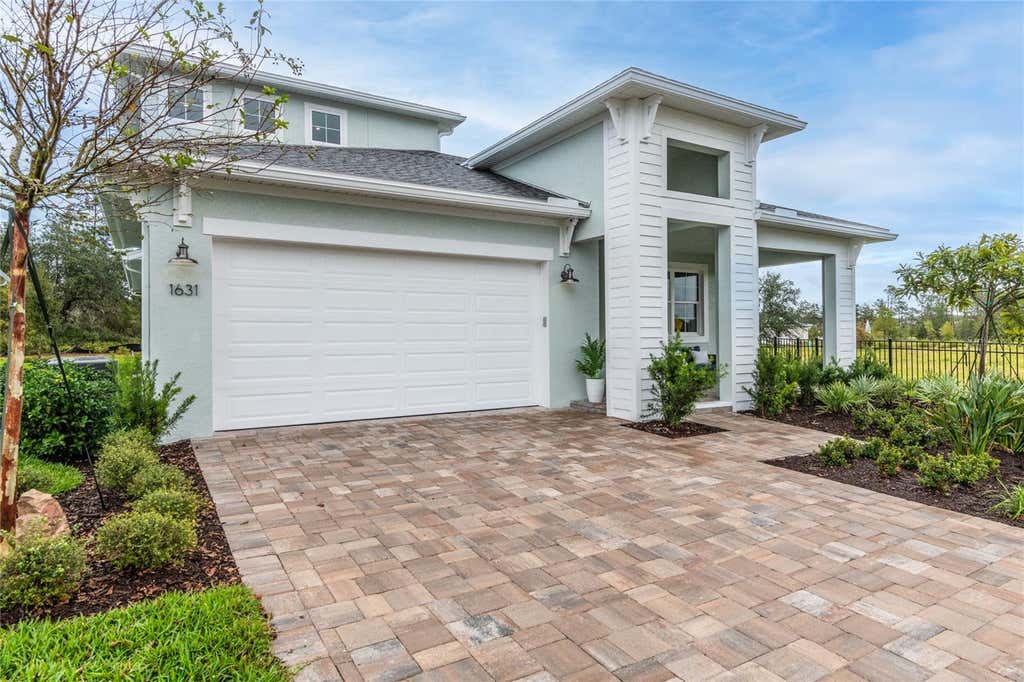 Photo of 1631 Lake Reserve Drive, Deland, FL 32724 (MLS # W7888483)