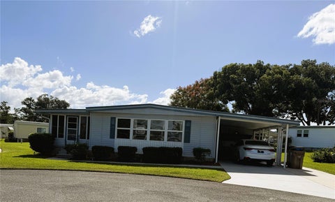 Photo of 101 Mandarin Cove, Leesburg, FL 34748 (MLS # G5119346)