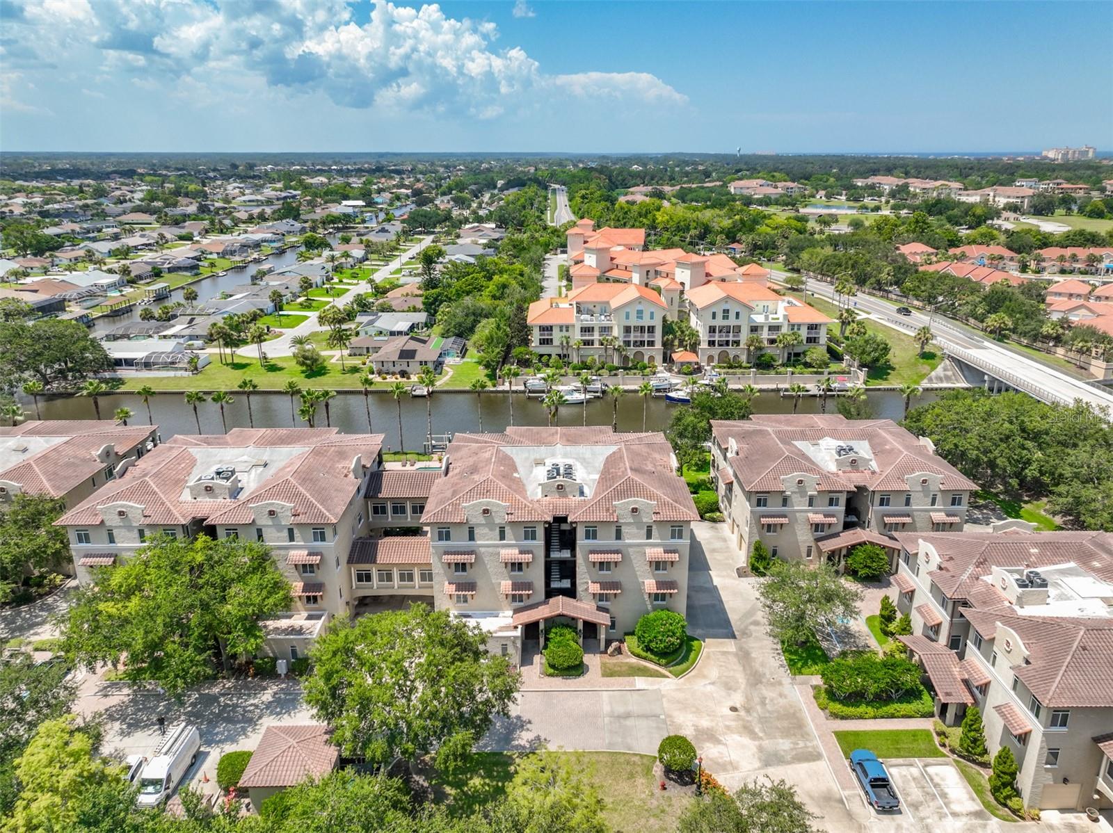 Condo living at its best! This almost 2300 square ft condo with a view to the pool and saltwater canal beyond feels like a stand alone home! Very large bedrooms with huge walk-in closets. Kitchen boasts plenty of cabinet space, granite counters, stainless steel appliances and a brand new refrigerator. Plenty of storage throughout the unit too. Plantation shutters throughout. One of a few units that give you direct access to the garage from inside the unit. Garage floor recently painted.
Step out to your huge private covered patio and walk just steps to the pool and bar-b-que area. Primary bedroom also has its own private patio area.
Your boat dock, which is INCLUDED IN THE ASKING PRICE, is also only steps away with a 10,000 lb boat lift that will accommodate a boat up to 25 feet. The intracoastal is just moments away!
Don't let the maintenance fee steer you away... so much is included: Spectrum cable includes some premium channels i.e. Disney+, Peacock, Paramount, AMC, Internet & WIFI, Building Insurance, Pest control and trash pick-up.
Additional fees are low- Average electric is less $100 per month. Contents insurance roughly $500 per year!
Great location! Close to the beach, shopping, golf and so much more! European Village is a short 5 minute walk!
St. Augustine and Daytona Beach are just a short drive away!