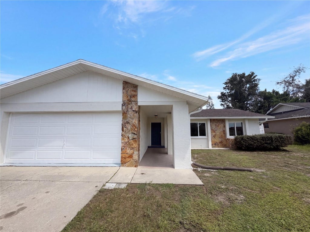 Photo of 11312 Possum Trail, Port Richey, FL 34668 (MLS # TB8548896)