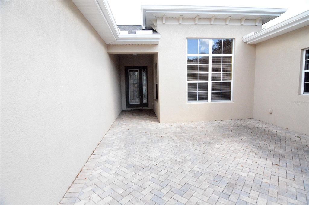 Photo of 2294 Sifield Greens Way #2294, Sun City Center, FL 33573 (MLS # O6409997)